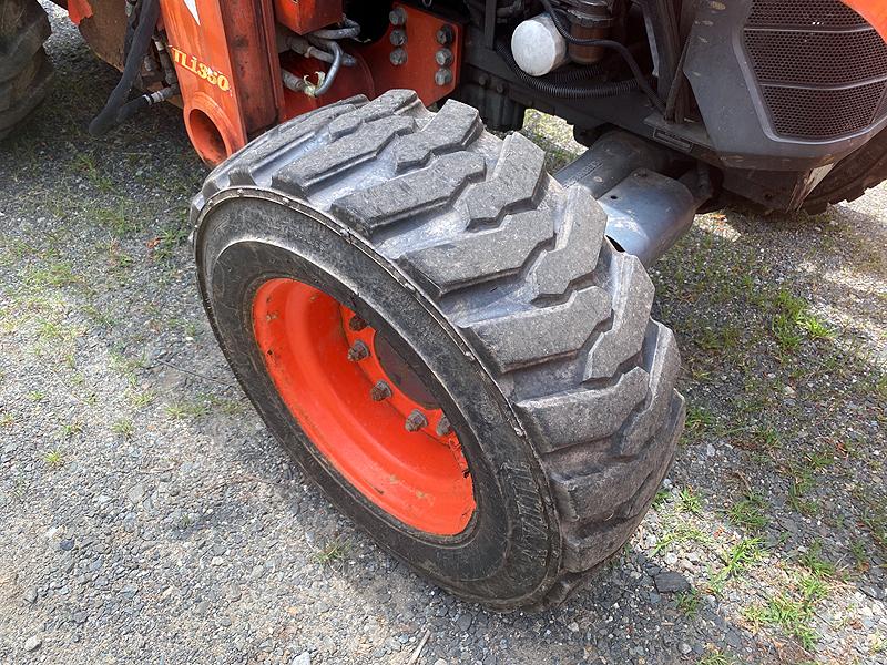 2012 Kubota M59 Loader Backhoe with TL3421 Front Bucket and Pair of Standard Length Forks