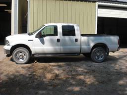 2006 White Ford 4 door pickup