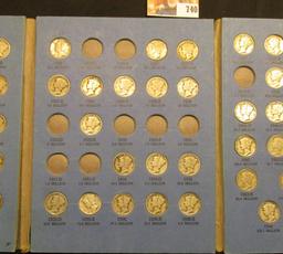 1916-45 Partial Set of Mercury Dimes in a blue Whitman folder. (60 pcs.).