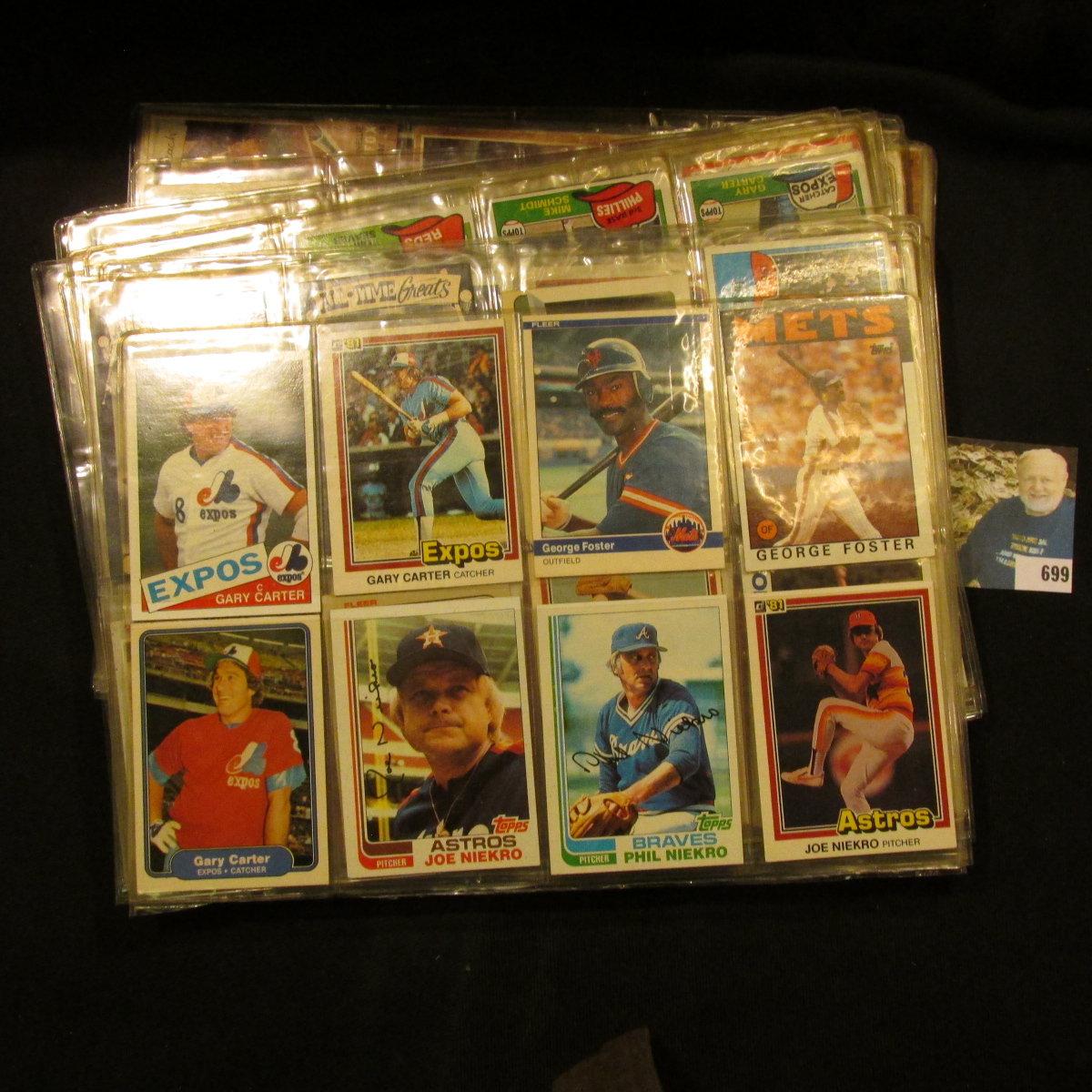 A group of more than (20) Plastic pages with Baseball Cards, some of which have been autographed. A