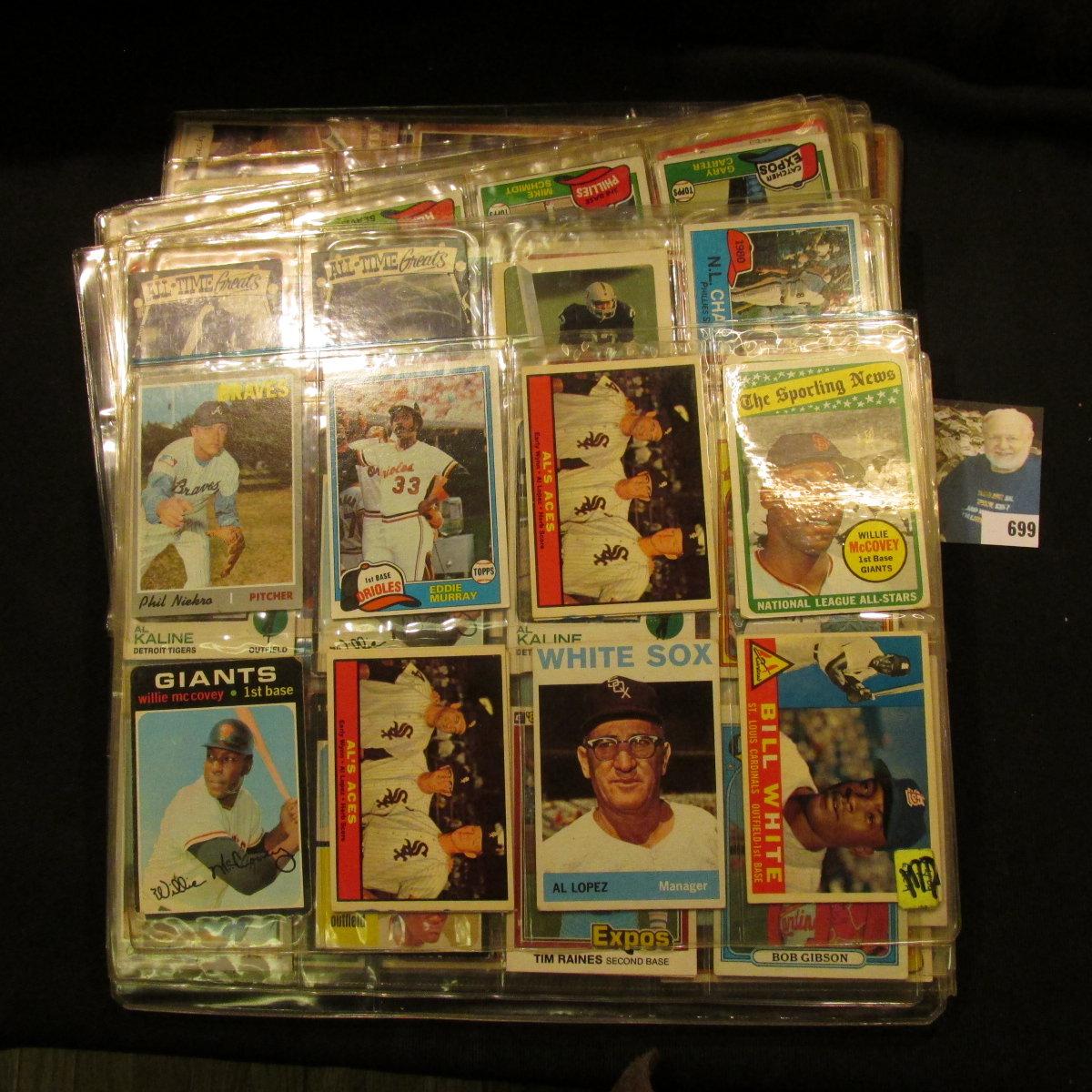 A group of more than (20) Plastic pages with Baseball Cards, some of which have been autographed. A