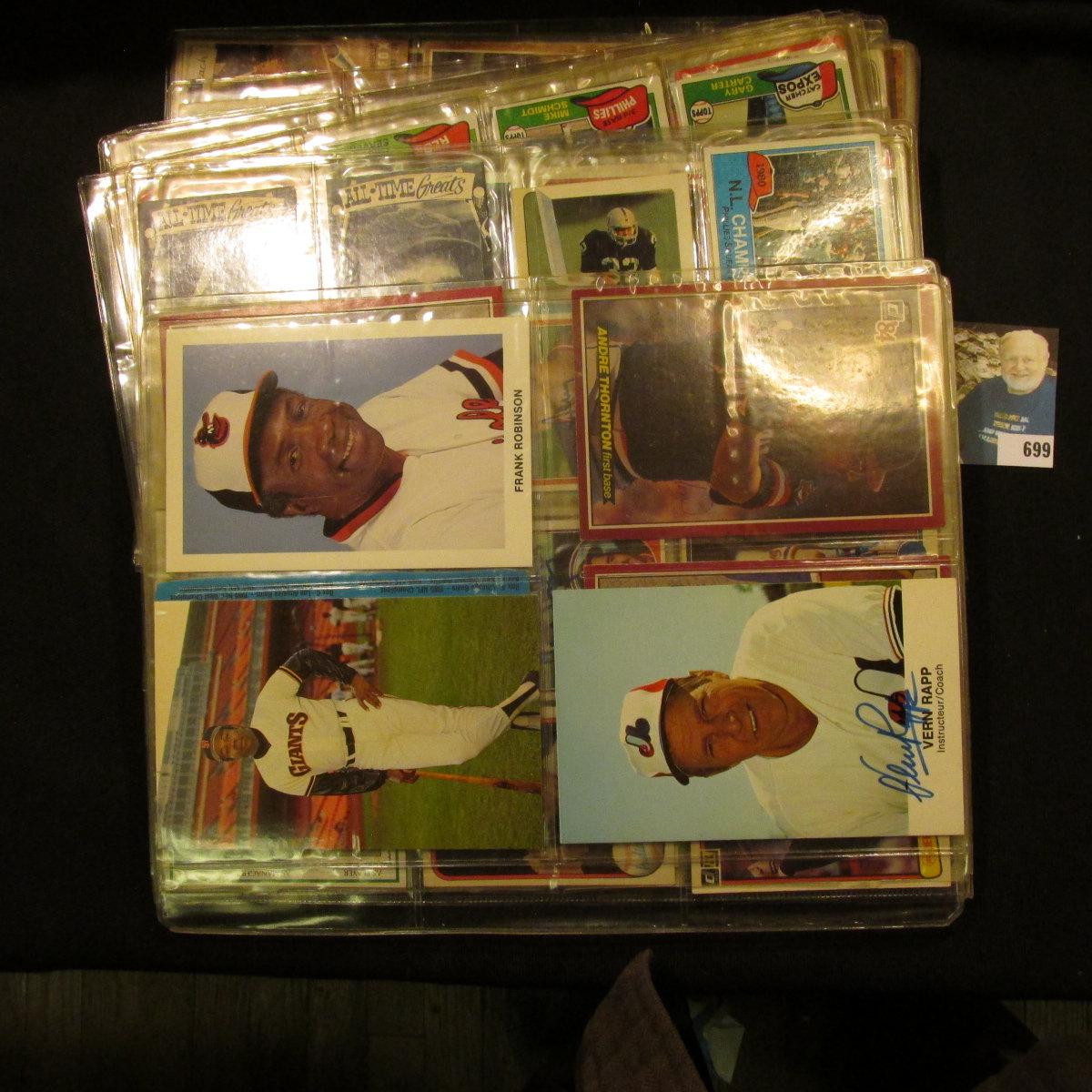 A group of more than (20) Plastic pages with Baseball Cards, some of which have been autographed. A