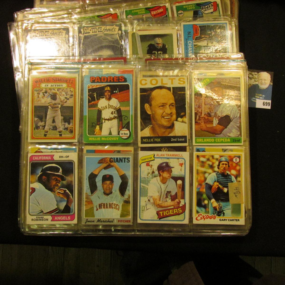 A group of more than (20) Plastic pages with Baseball Cards, some of which have been autographed. A