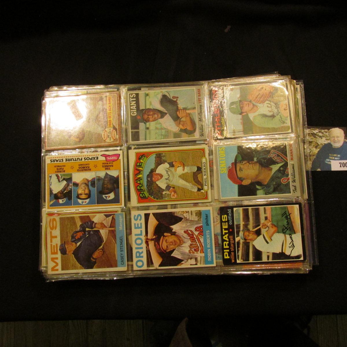 A group of more than (20) Plastic pages with Baseball Cards, some of which have been autographed. A