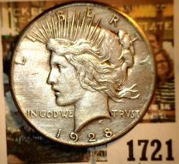 1721 _ 1928 P U.S. Silver Peace Dollar, lightly toning, cleaned, AU.