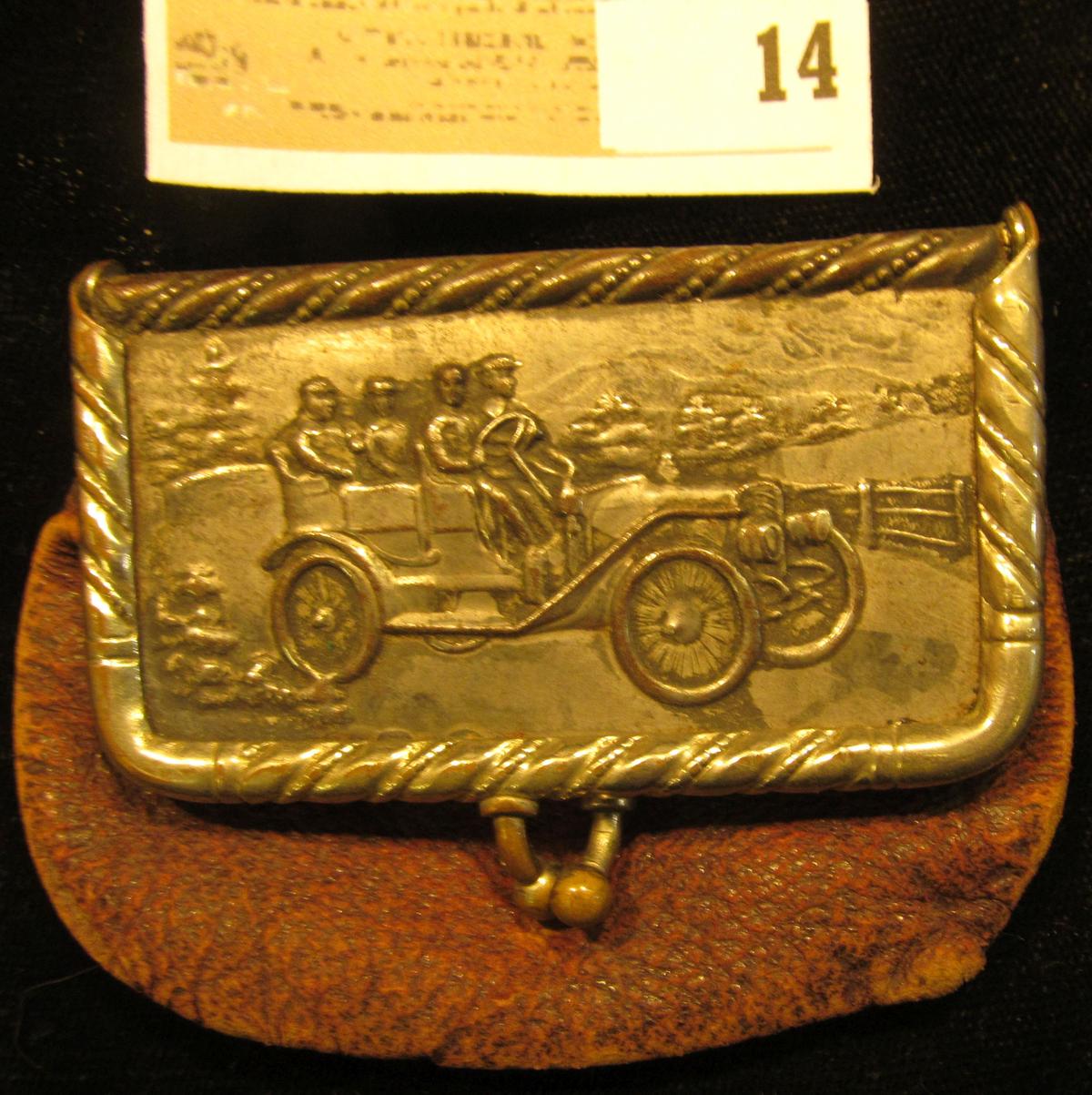 Coin Purse with a metal latch depicting an antique Convertible Car. Labeled inside "Carberry's/Cor.