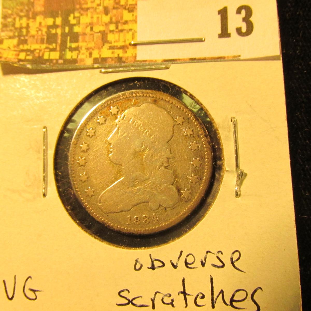 1834 Small size Capped Bust Quarter, VG, obverse scratches.