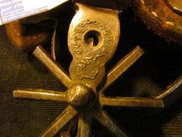 Pair of Hand forged and engraved Western Spurs. Little damage to the leather. Spurs work fine.