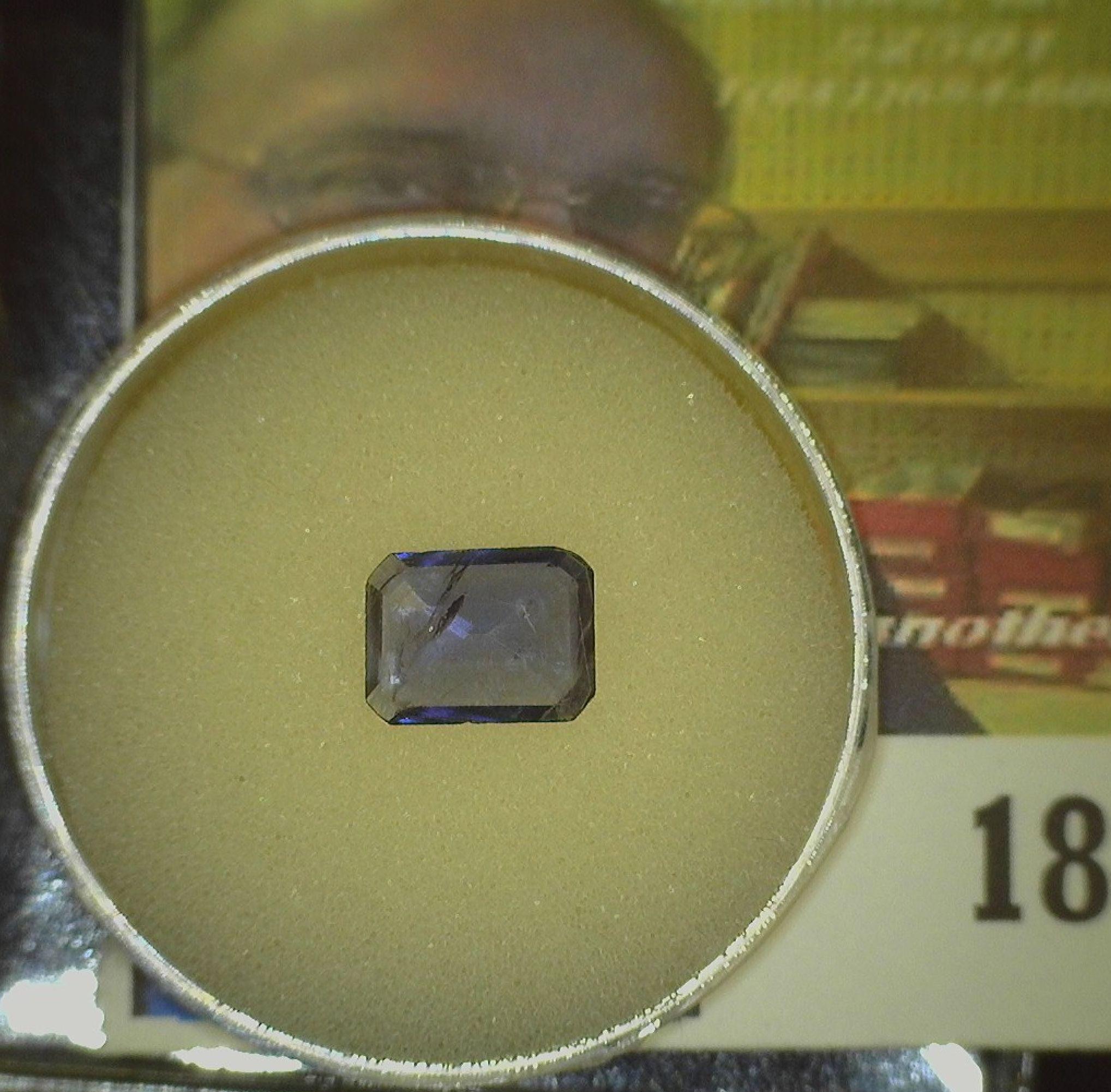 Rectangular faceted Precious Iolite Gem weighing 1.54 carats and ready to be mounted in a piece of j