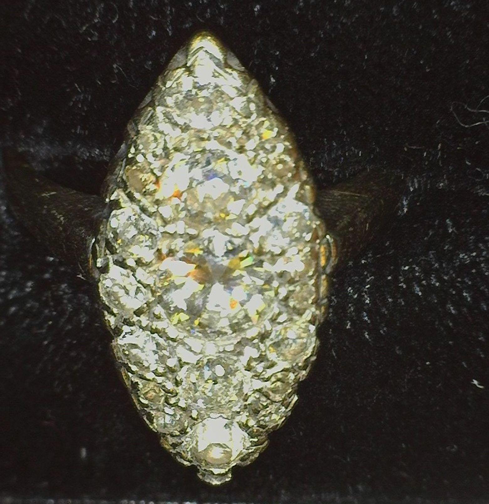 Ladies Size 7 Marquis shaped Diamond Ring with 19 Mine Cut Diamonds with graduated sizes up to appro