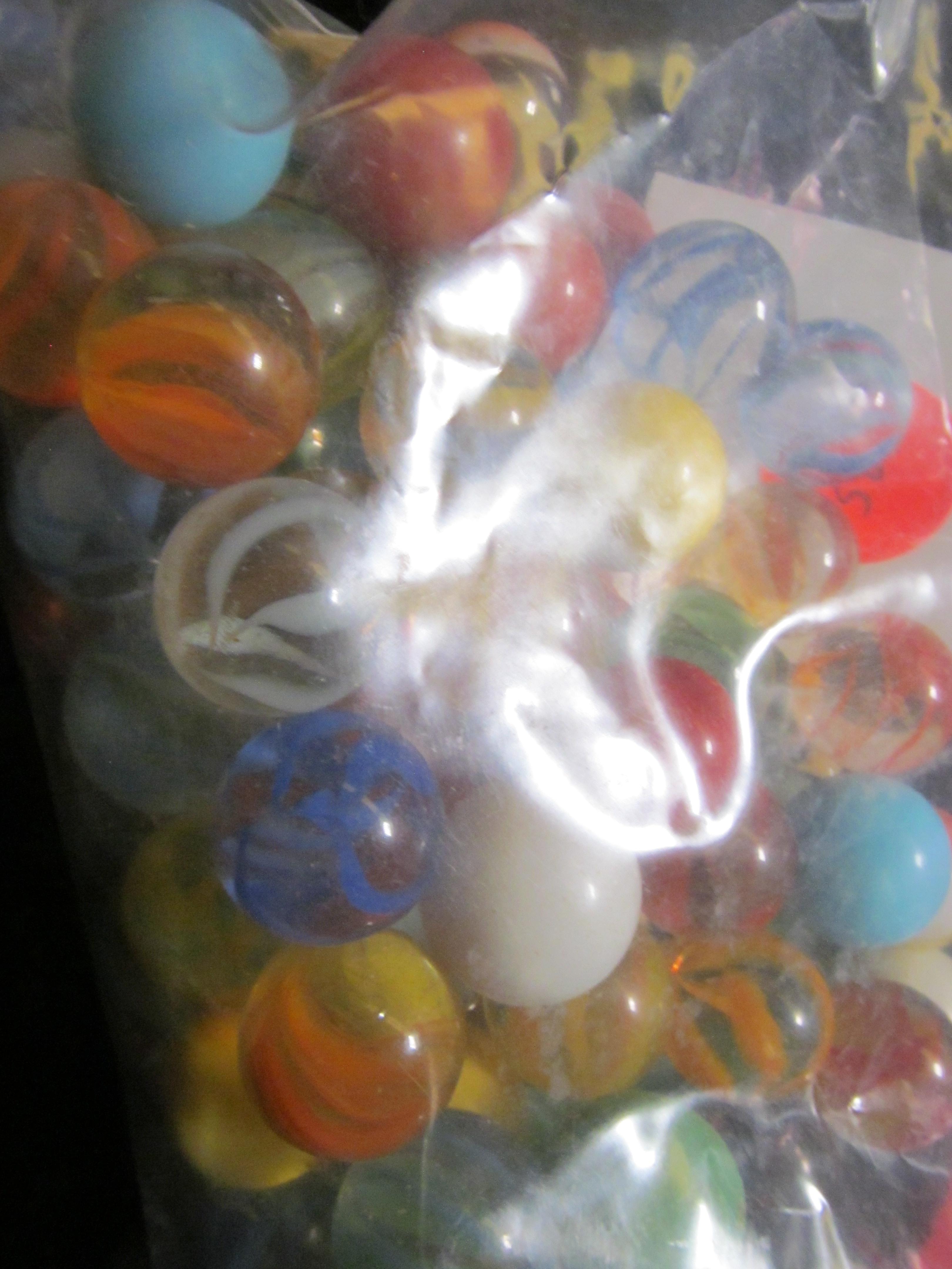 Group of marbles and dice