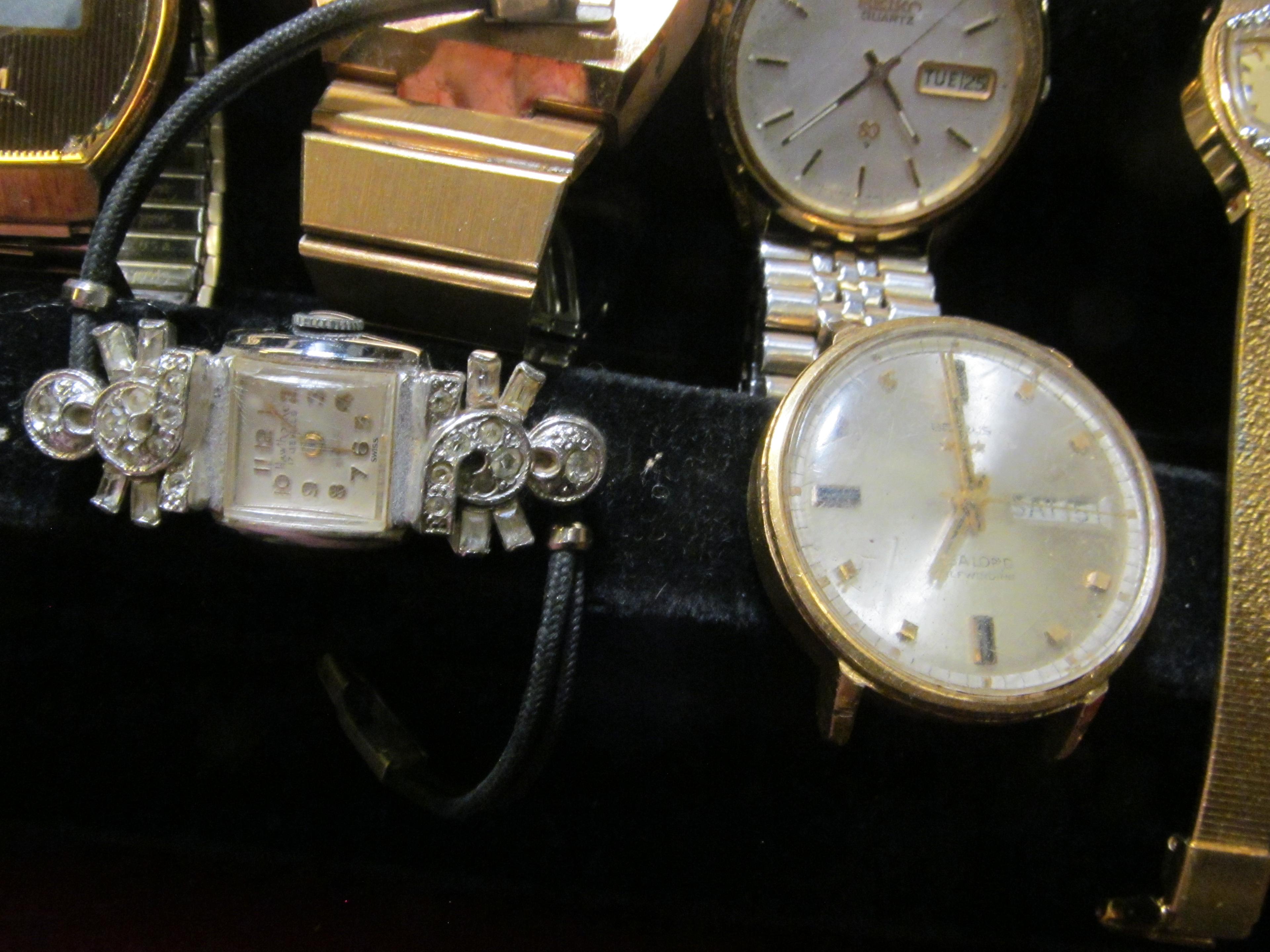 11 random watches for parts or repair, brands include Seiko, Bulova, Benrus and Hawthorne