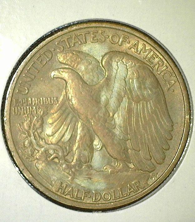 1938 Walking Liberty Half Dollar, AU, album toned reverse, value $45"