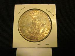 1900 P Morgan Silver Dollar, high grade.