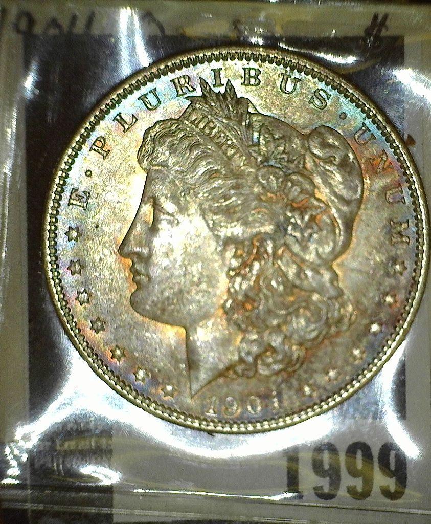 1904 O Morgan Silver Dollar, with superb toning in lavendars and gold.