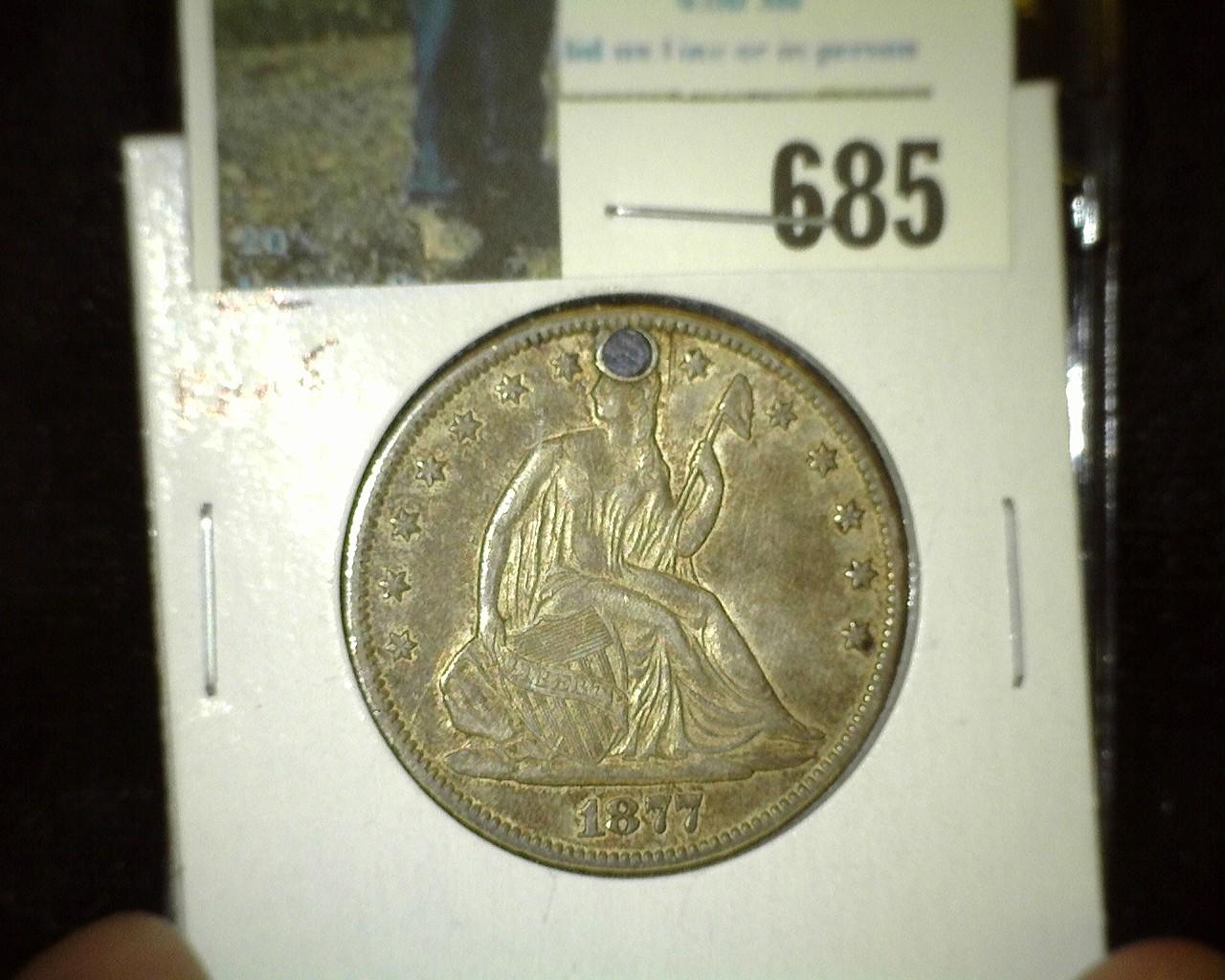 1877 CC U.S. Seated Liberty Half Dollar, holed.