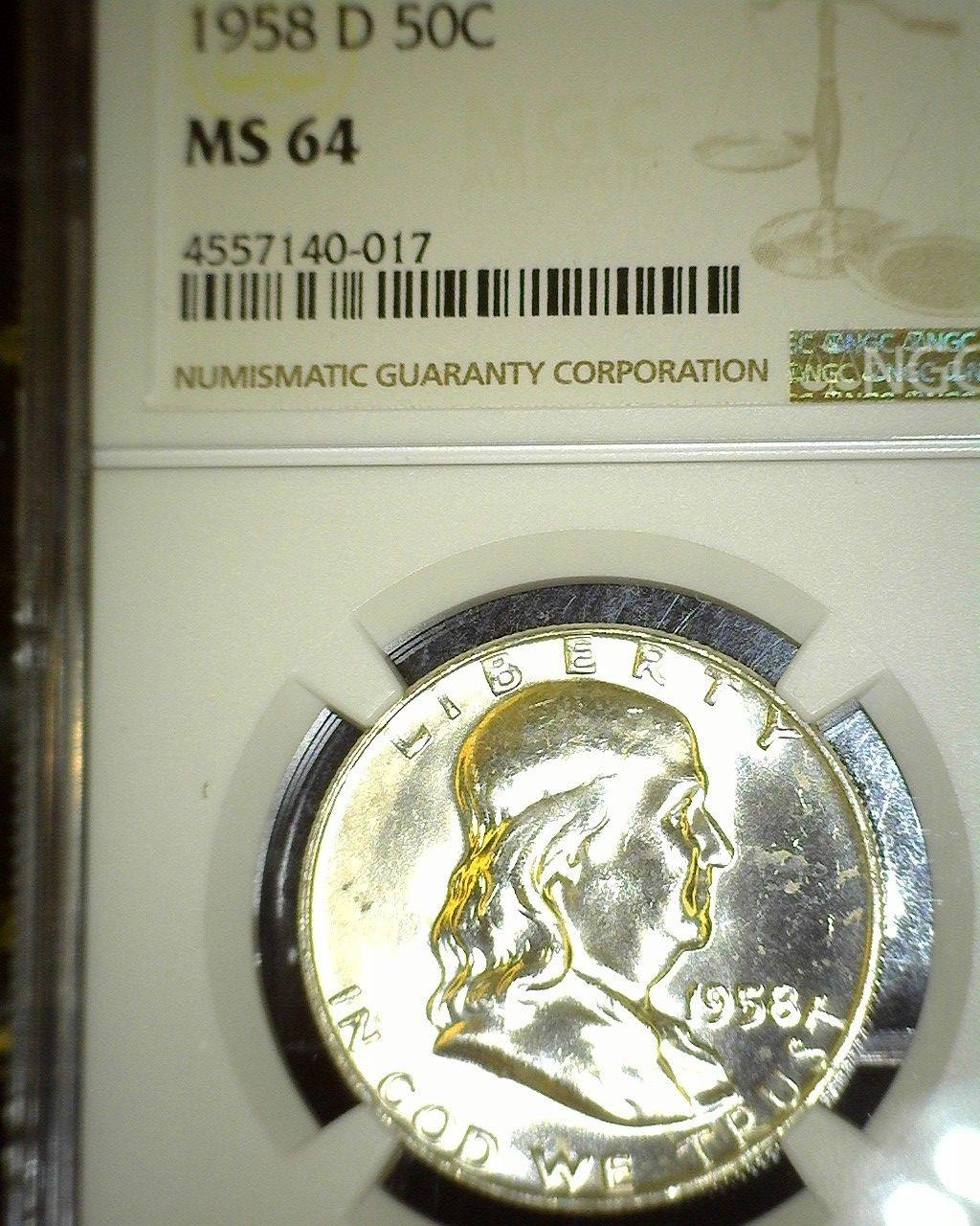 1958 D Franklin Half Dollar NGC slabbed "MS 64".