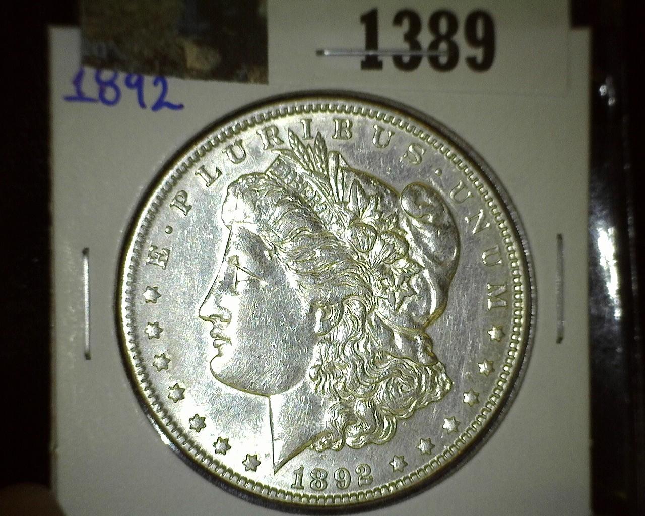 1892 P Morgan Silver Dollar, very scarce and quite flashy.
