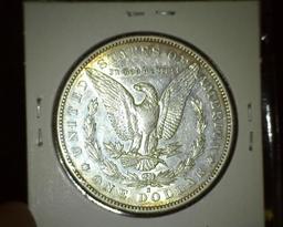 1890 S Morgan Silver Dollar, lots of flash and some natural toning.