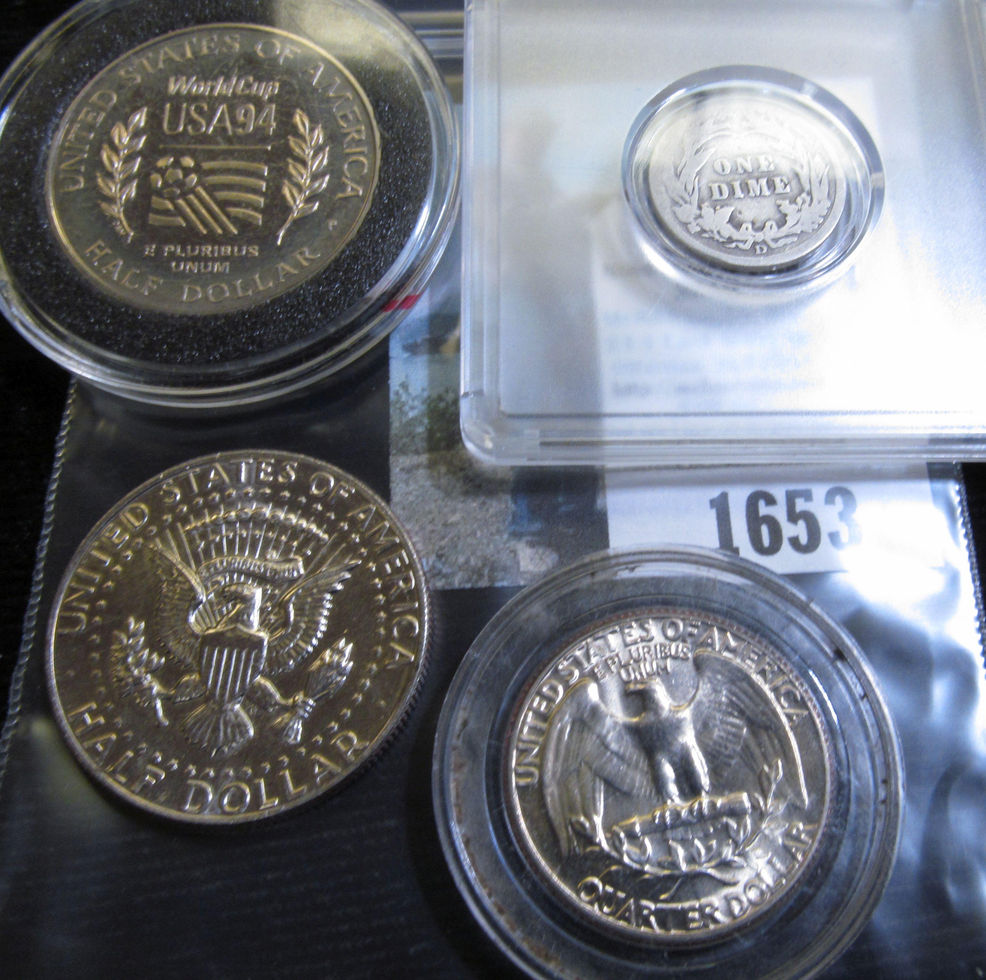 Kennedy Half Dollar with Lincoln's Head sticker on it; 1912 D Barber Dime in a Snaptight case; 1994