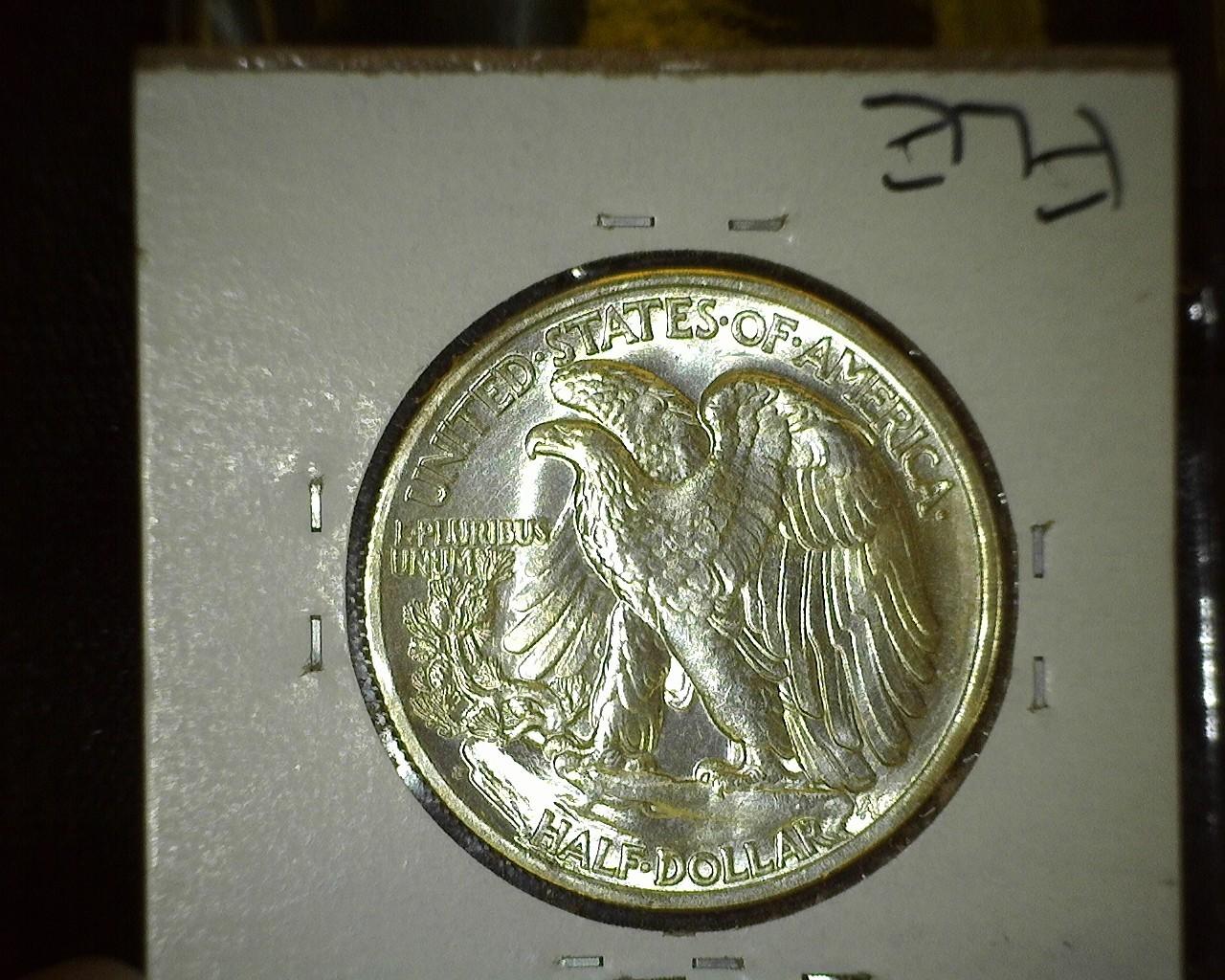 1940 S Walking Liberty Half Dollar, Brilliant Uncirculated.