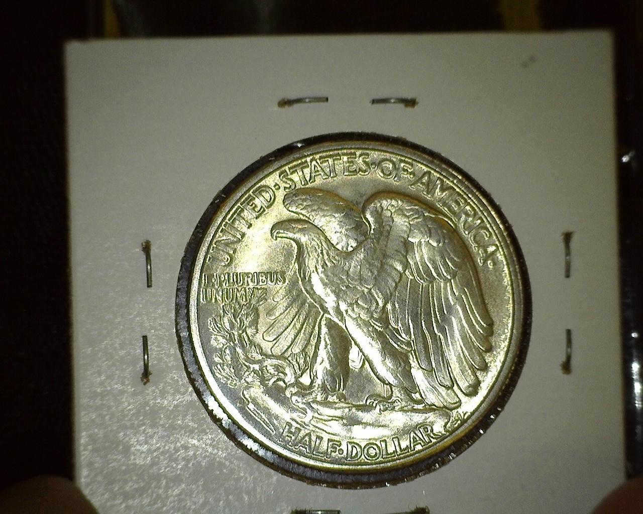 1947 D Walking Liberty Half Dollar, Super Gem BU with just a hint of toning on the lower obverse.