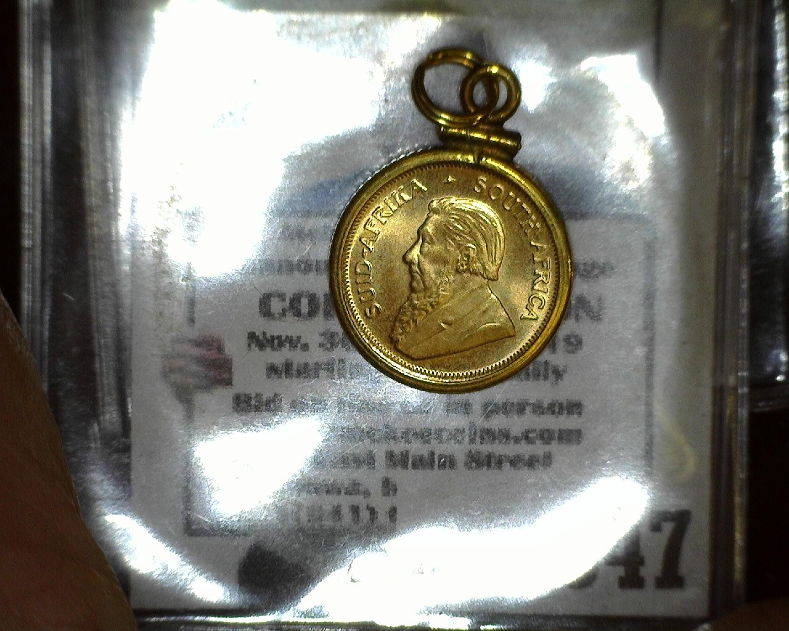 1984 One-Tenth Ounce Gold Krugerrand in a bezel and ready to be suspended from a Necklace.