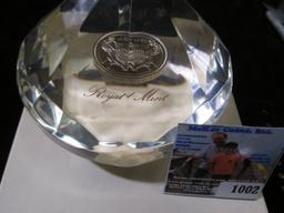 Large Diamond shaped Lucite Paperweight with a Great Britain Two Pound Sterling Coin embedded in the