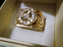 Gold colored Ring with Cubic Zirconium Stones, new in gift box.