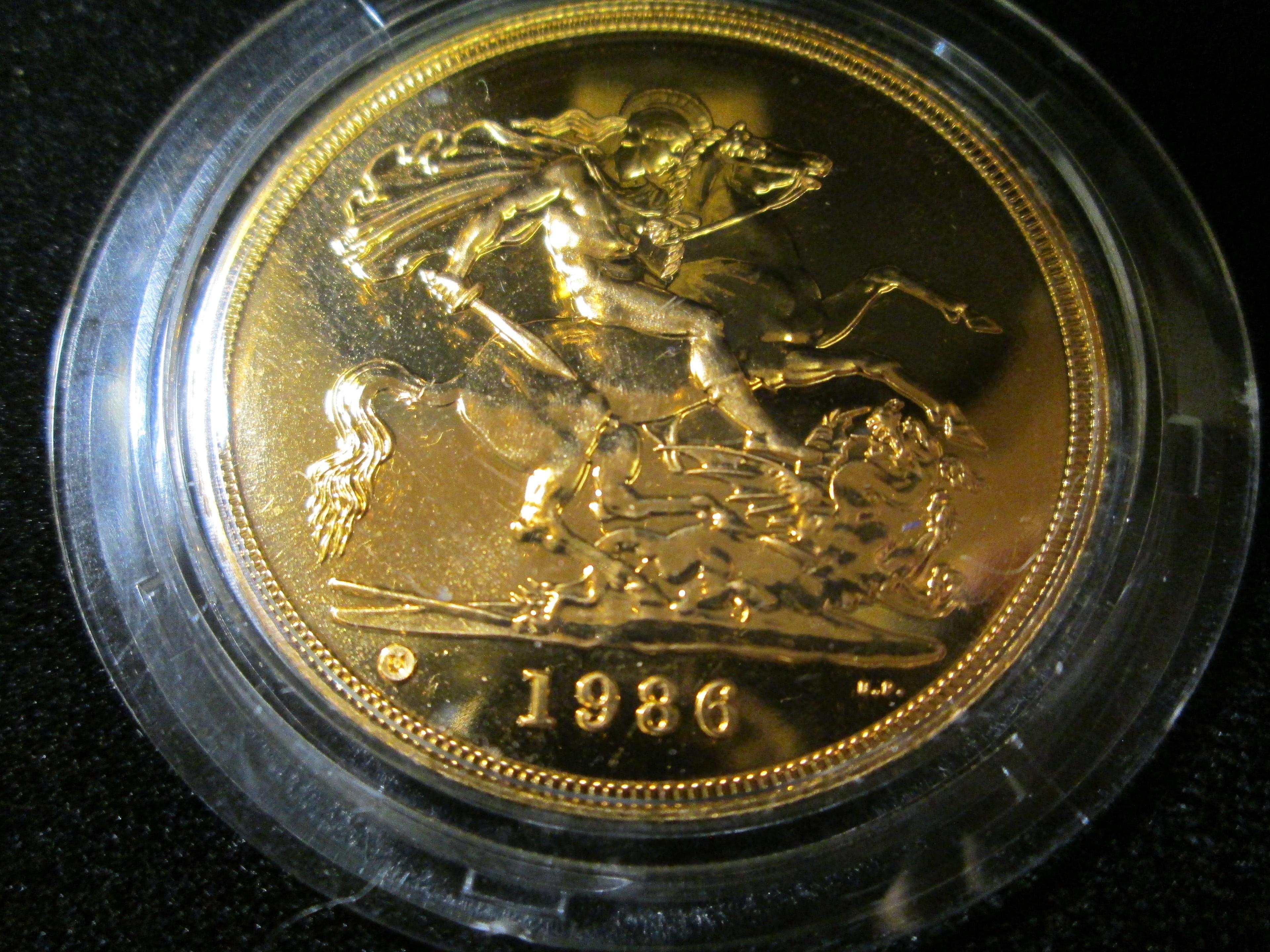 1986 Great Britain Five Pound Gold Coin In Original Case Of Issue. Mtg. 7,723 Pcs. Km#945. Weighs 39
