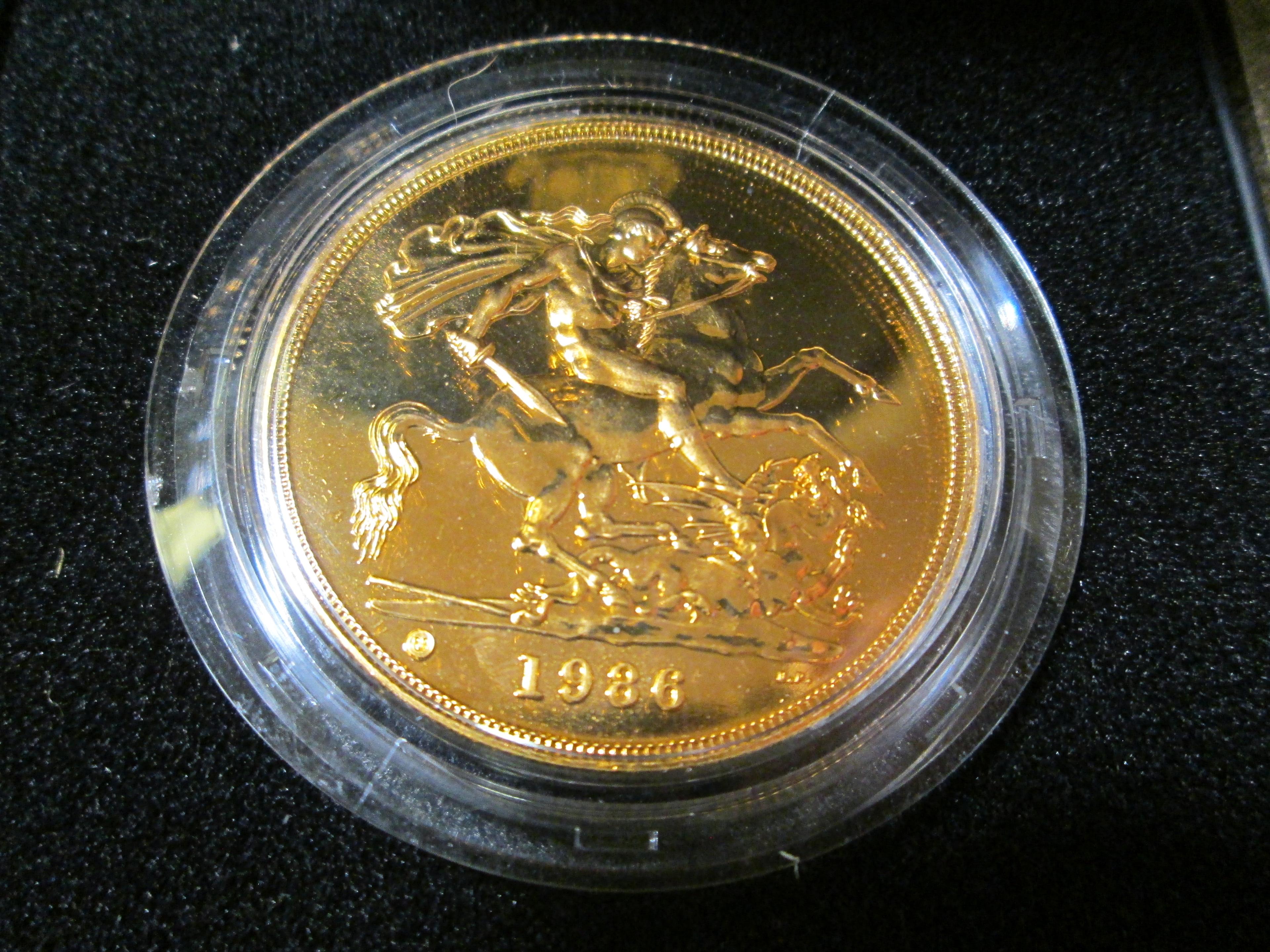 1986 Great Britain Five Pound Gold Coin in original case of issue. Mtg. 7,723 pcs. KM#945. Weighs 39