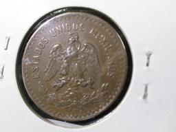 1921 Mexico Five Centavos, KM422, Brown AU. $75 catalog value in EF.