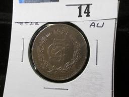 1921 Mexico Five Centavos, KM422, Brown AU. $75 catalog value in EF.