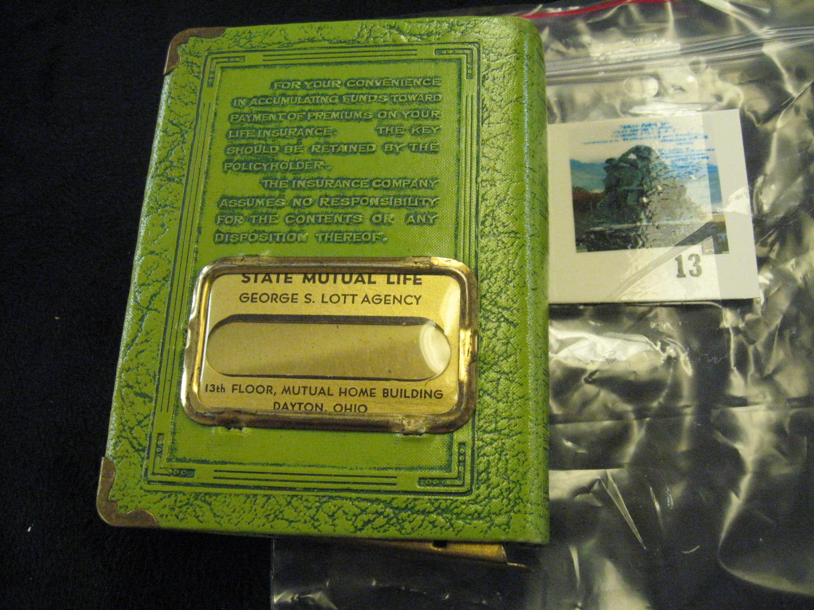 "Time Flies" leather bound book style coin safe with key, advertising premium from State Mutual Life