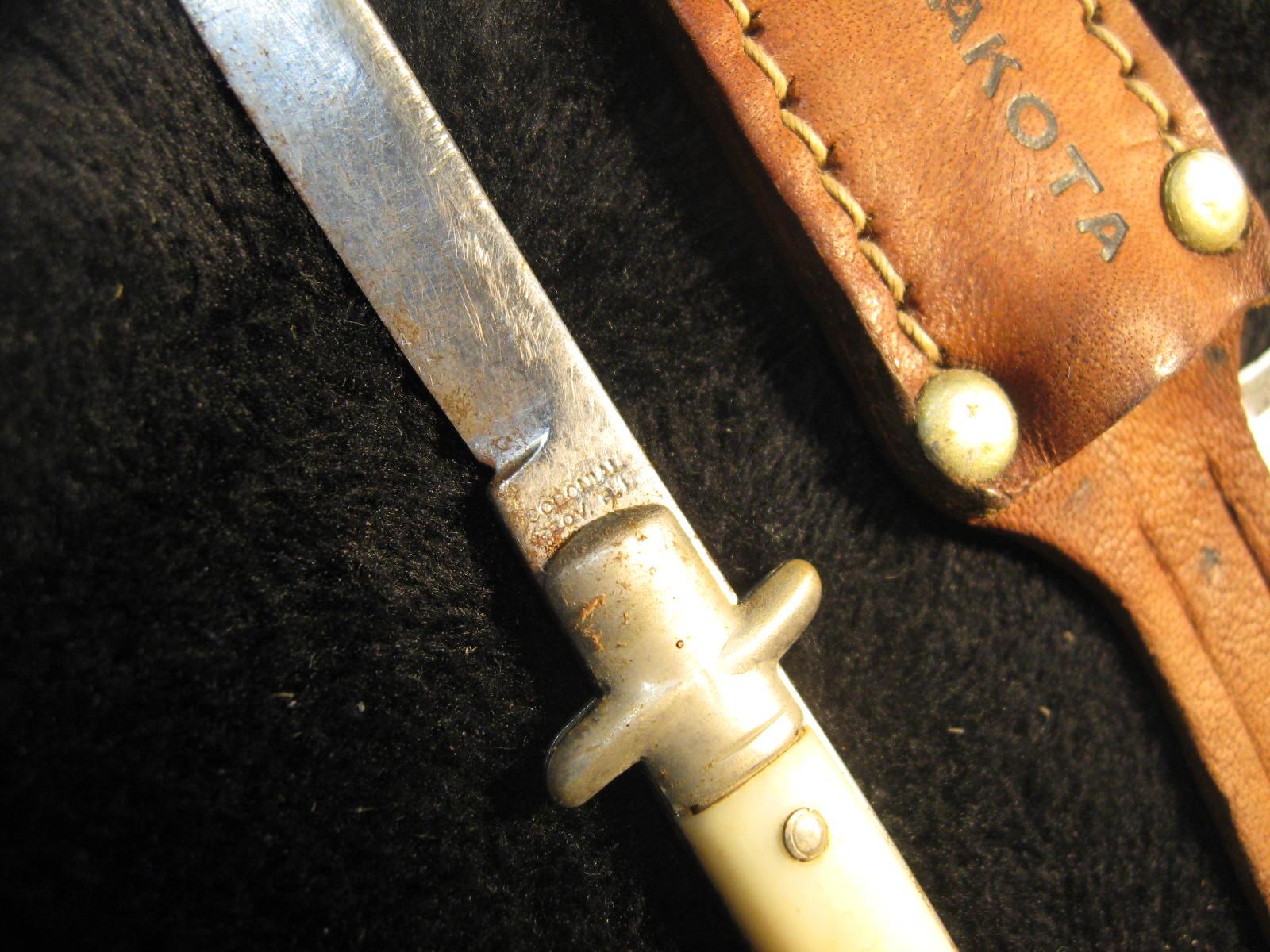 Very small North Dakota Sheath Souvenir Knife with Sheath. Manufactured by Colonial knife Co. in Pro