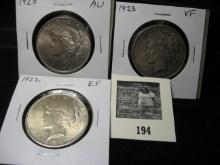 1922 P EF, 1923 P VF, & 1923 P AU U.S. Silver Peace Dollars.