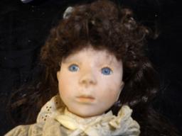 Over 16" tall Dynasty Doll with hang tag. Dynasty dolls are made from fine tinted porcelain bisque p