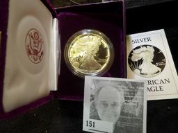 1986 S American Eagle One Ounce Silver Proof Dollar in original box as issued. First year of issue.