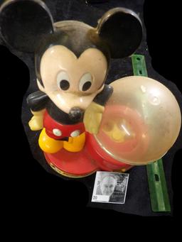 Mickey Mouse Gum Ball Bank in functioning condition. Could use cleaned a little bit.