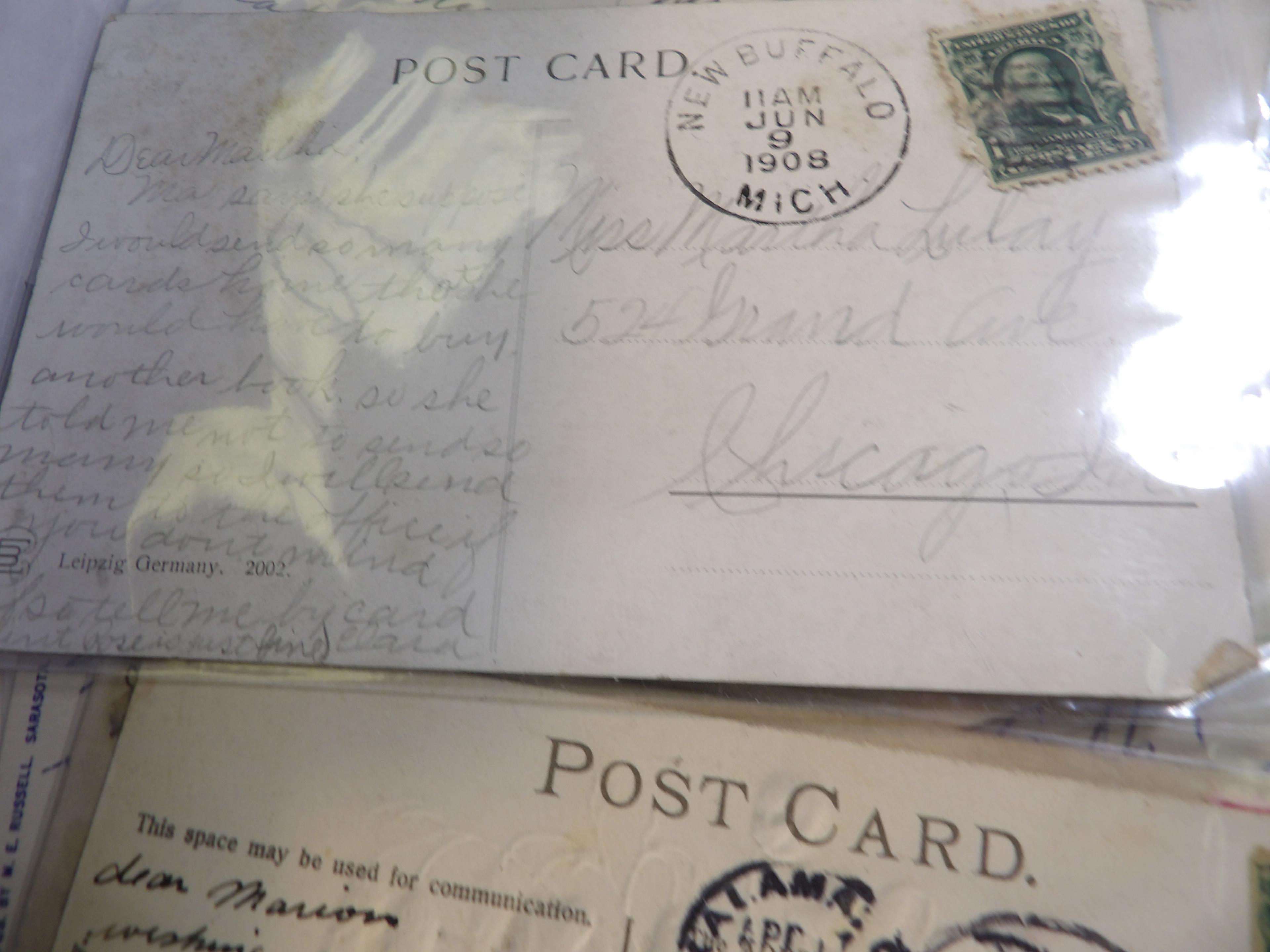 Approximately 900 Old Post Cards in a Postal Card box. Many have interesting Post Marks and cancelle