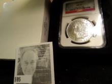 1884 O Morgan Silver Dollar NGC slabbed MS 63 and stored in a velvet-lined box.