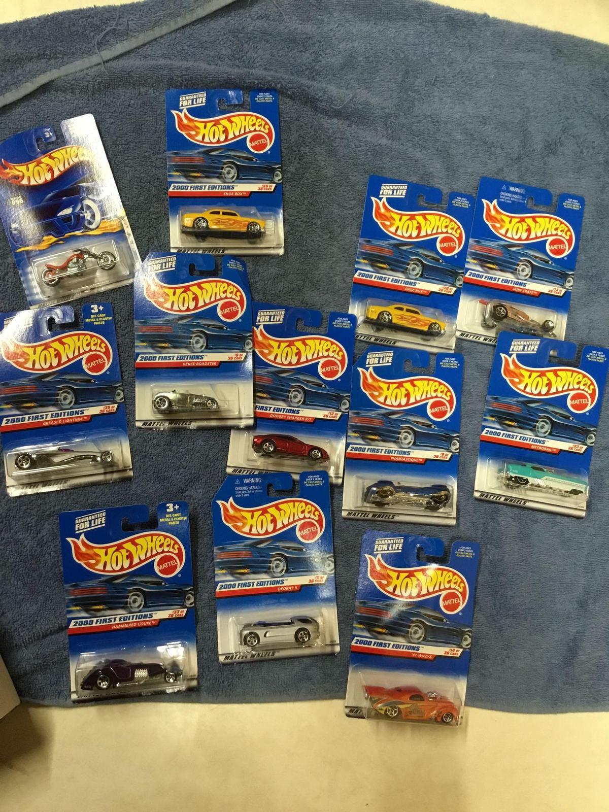 vintage 12 piece box of diecast car sealed 1999