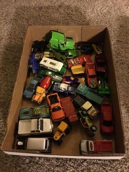 box of miscellaneous old cars