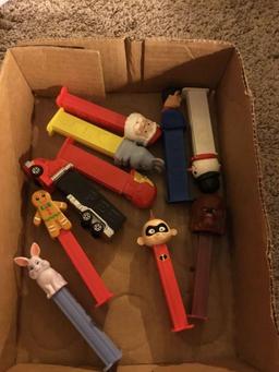 box of miscellaneous Pez dispensers