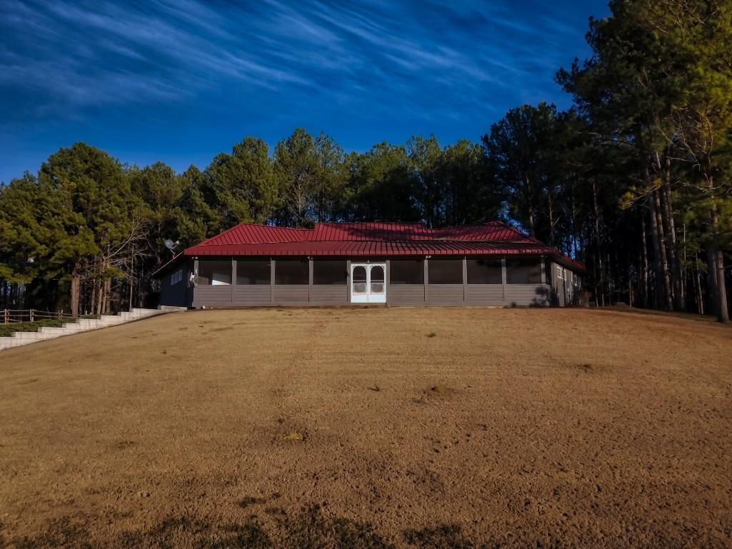 3,150+/- Sq. Ft. Custom Built Cypress & Rock Exterior Home, 3 BR, 2 BA on 115+/- Acres