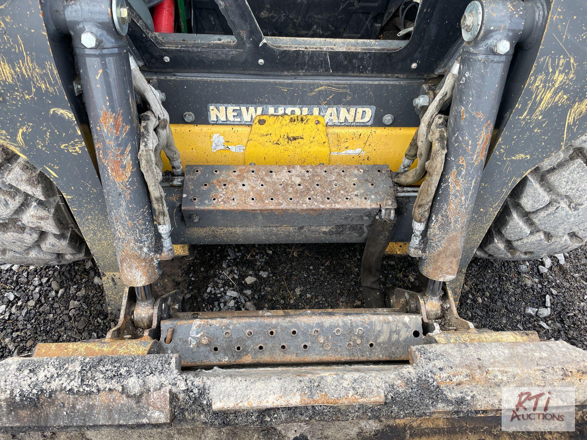 2013 New Holland L225 skid loader, GP bucket, cab (missing door) power wedges, heat, AC, hand and