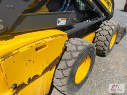 New Holland 228 skid steer loader with cab and GP bucket, heat, A/C, hand and foot controls, 1860