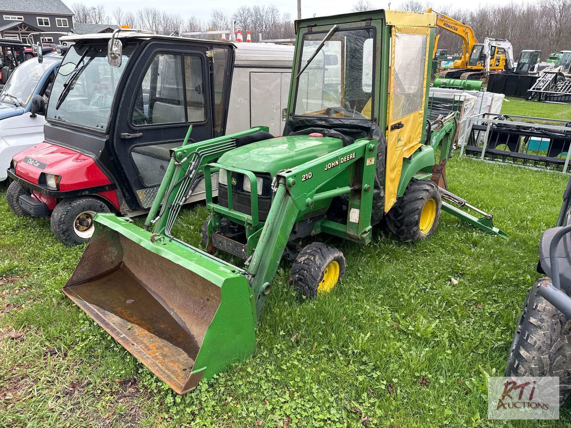 John Deere 2210 4WD compact diesel tractor with loader, backhoe, cab, 1333 hrs