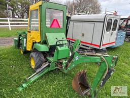 John Deere 2210 4WD compact diesel tractor with loader, backhoe, cab, 1333 hrs