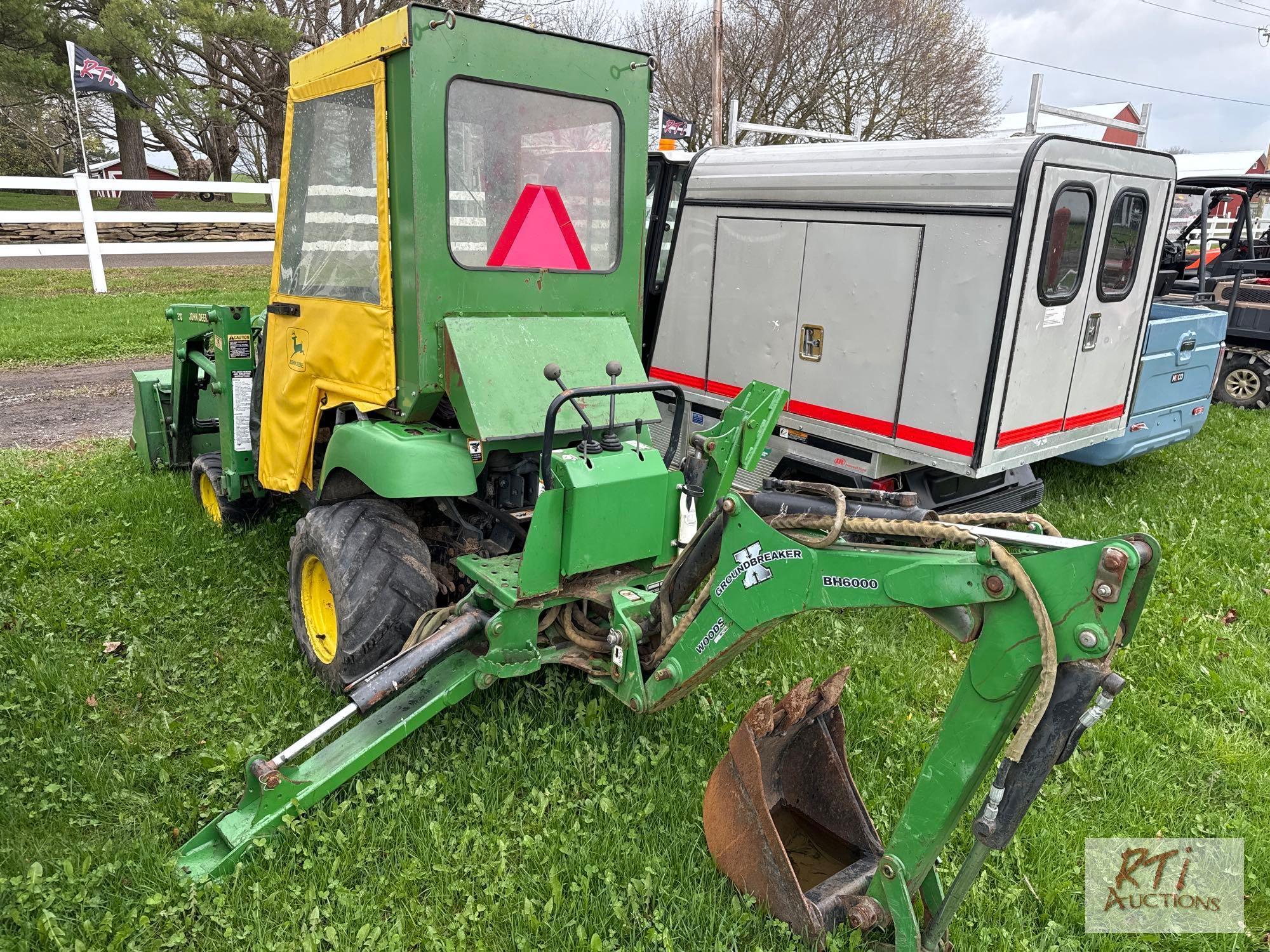 John Deere 2210 4WD compact diesel tractor with loader, backhoe, cab, 1333 hrs